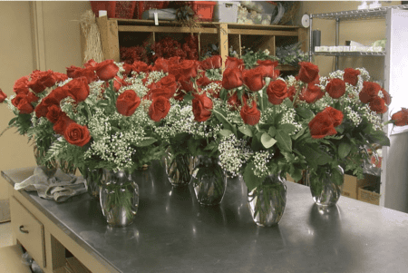 Vases of roses at Shotwell Floral